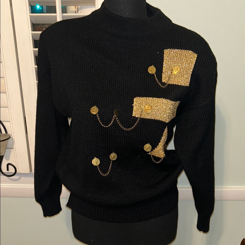 Chic Black Sweater with Gold Accents